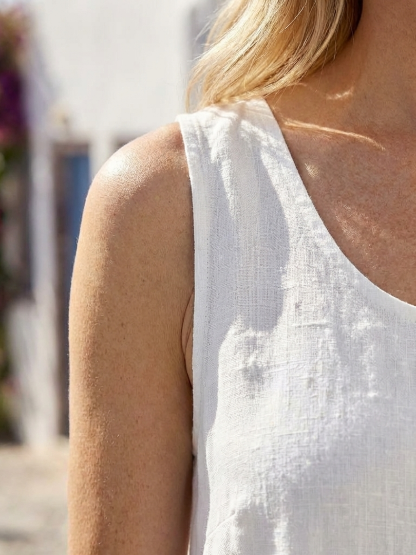 Ismera | Elegante vestido midi de corte holgado, sin mangas y con cuello redondo