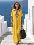 Amarina | Elegante vestido largo de lino bordado con escote en V
