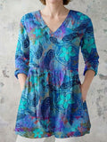 Juliette: Blusa fluida de línea larga con escote en V