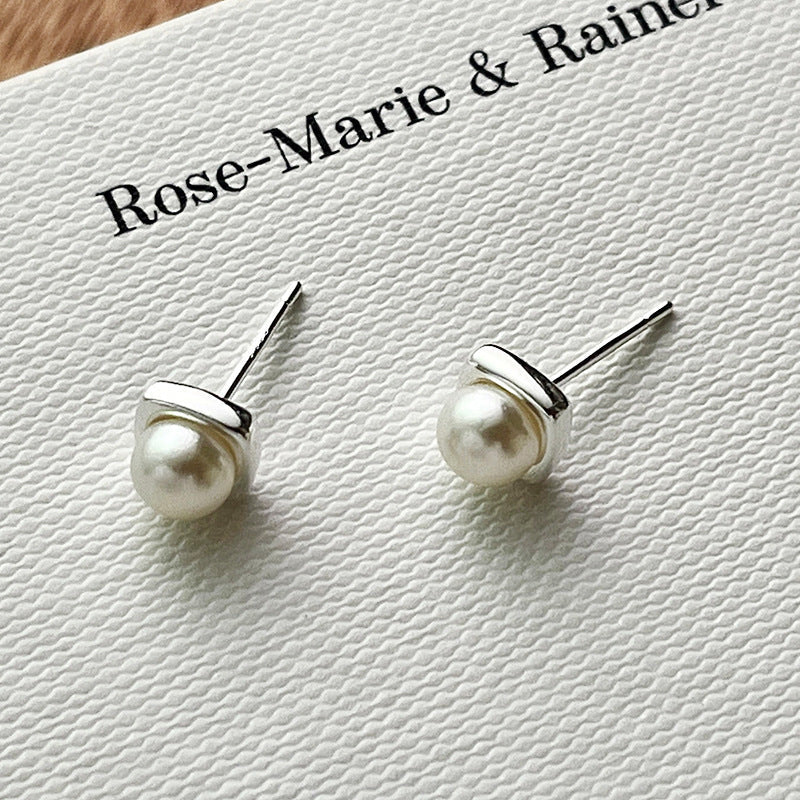 Pendientes colgantes elegantes de perlas de agua dulce