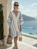 Serenella | Elegante vestido con escote en V, largo hasta la rodilla y mangas amplias y vaporosas
